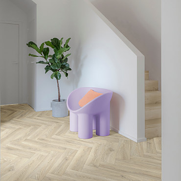 A hallway with a fitted vinyl floor