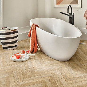 A bathroom with a fitted floor